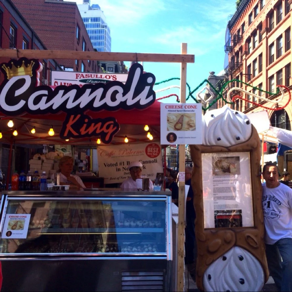 Caffè Palermo Cannoli King stand at a Little Italy street celebration